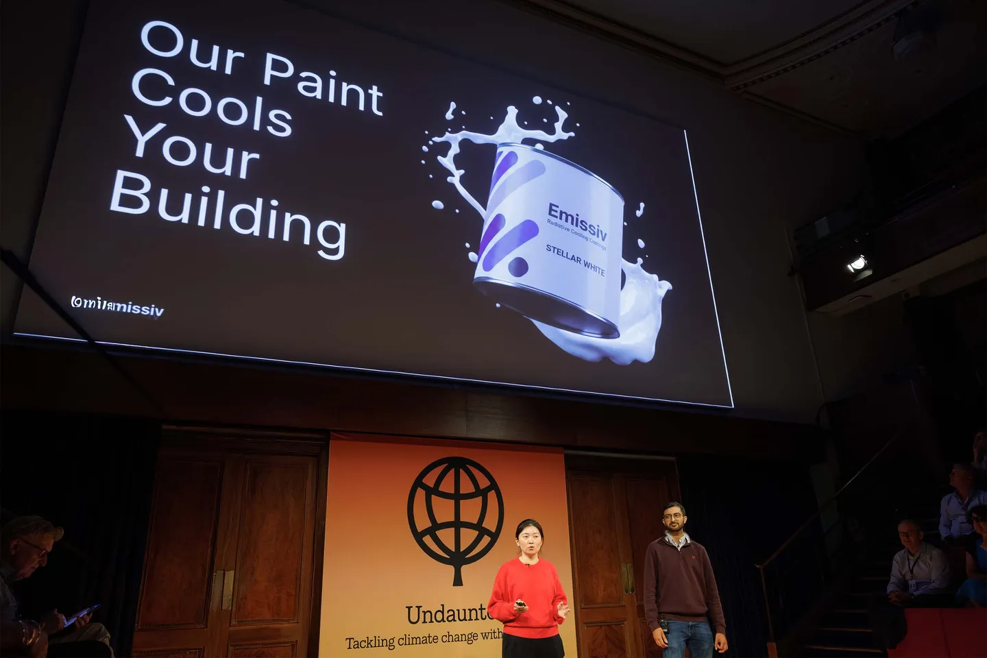 Sandra Go and Nikhil Dawda, Co-founders of Emissiv, take to the stage to pitch to investors